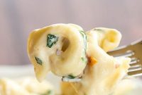 Tortellini with Spinach and Sun-Dried Tomatoes in a Garlic-Parmesan Cream Sauce